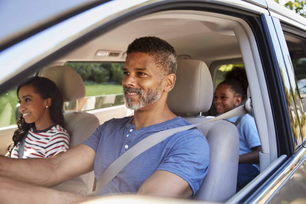 how old do you have to be to sit in the front seat